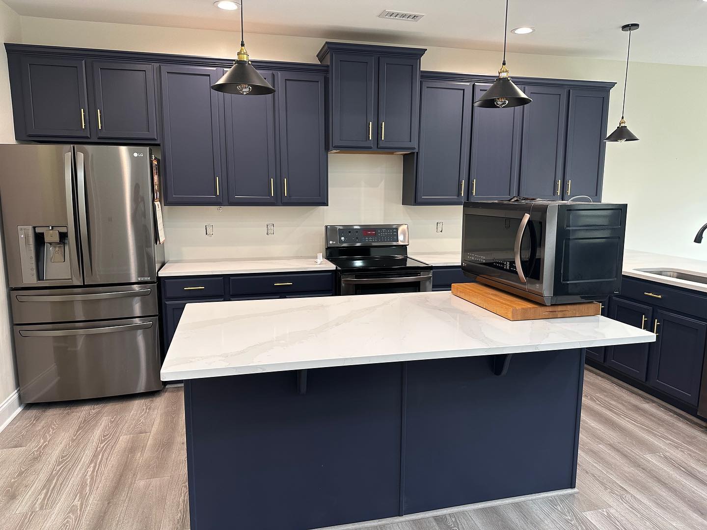 kitchen with blue painted kitchen cabinets Charlotte Glennys Painting